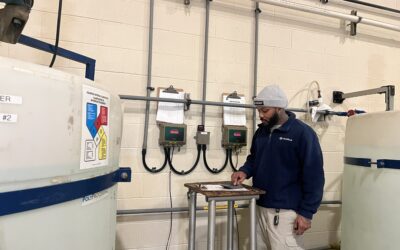 Operator-in-Training Elias Dixon confirming the polymer dosage.