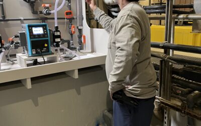 Class III Operator Lonnie Hudson Verifies Coagulant Feed Rate