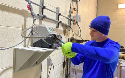 Ensuring Reliability: Technician Kenneth Moore Repairs Sodium Permanganate Metering Pump