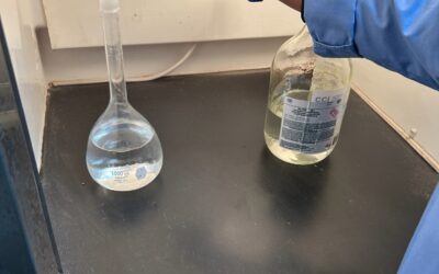 Lab Analyst Jarisha Binion Preparing Hydrochloric Acid Solution